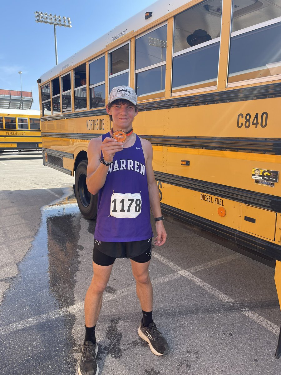 Freshman, Parker S. bringing home some hardware today. 10th out of 203 jv runners!