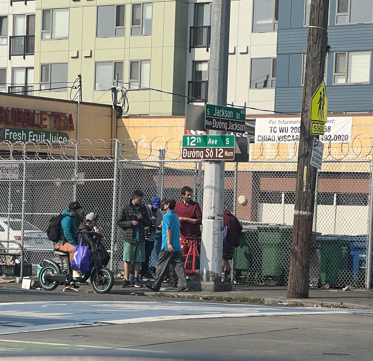 DQuinlanSeattle's tweet photo. Seriously? Rampant drug use, crack pipes, and dealing out in the open daily about 150 yards from a school. C’mon Seattle, you have to do better. @SeattlePD @bruceharrell @KIRO7Seattle @komonews https://t.co/Tz7FzBW8xh