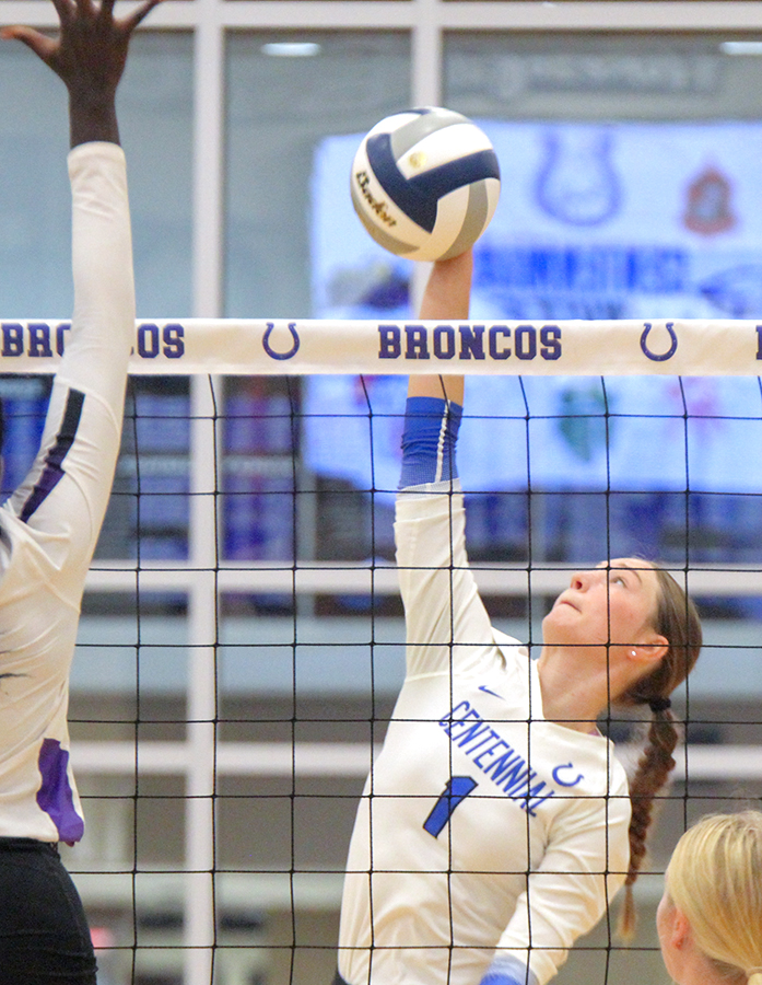 VB: <a href="/coraepayne15/">Cora Payne</a> of <a href="/CentennialVB18/">Centennial Volleyball</a> attacks against Wood River Aug. 26. #broncoblue #swingforthefloor