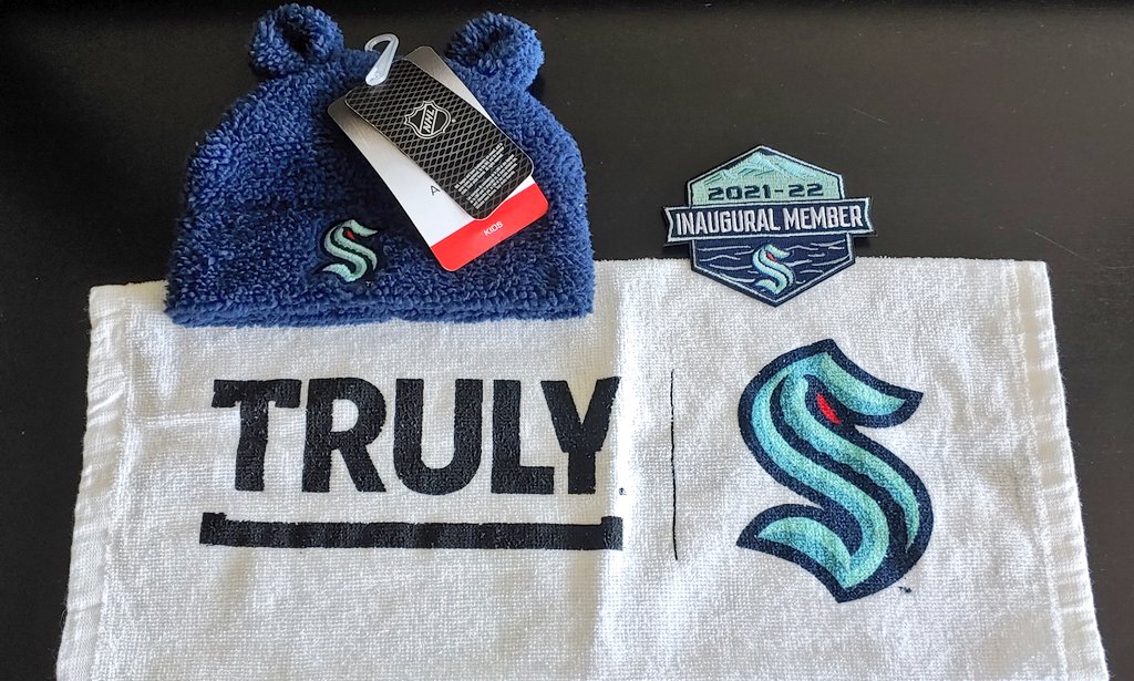 SasquatchNHL's tweet photo. In honor of Bob Barker, I'm gonna 'spin the wheel' and giveaway this adorable baby #SeaKraken beanie, @trulyseltzer rally towel, and inaugural member patch. Like and Repost by 9PM PT to enter. https://t.co/Uf3AZcPeq0