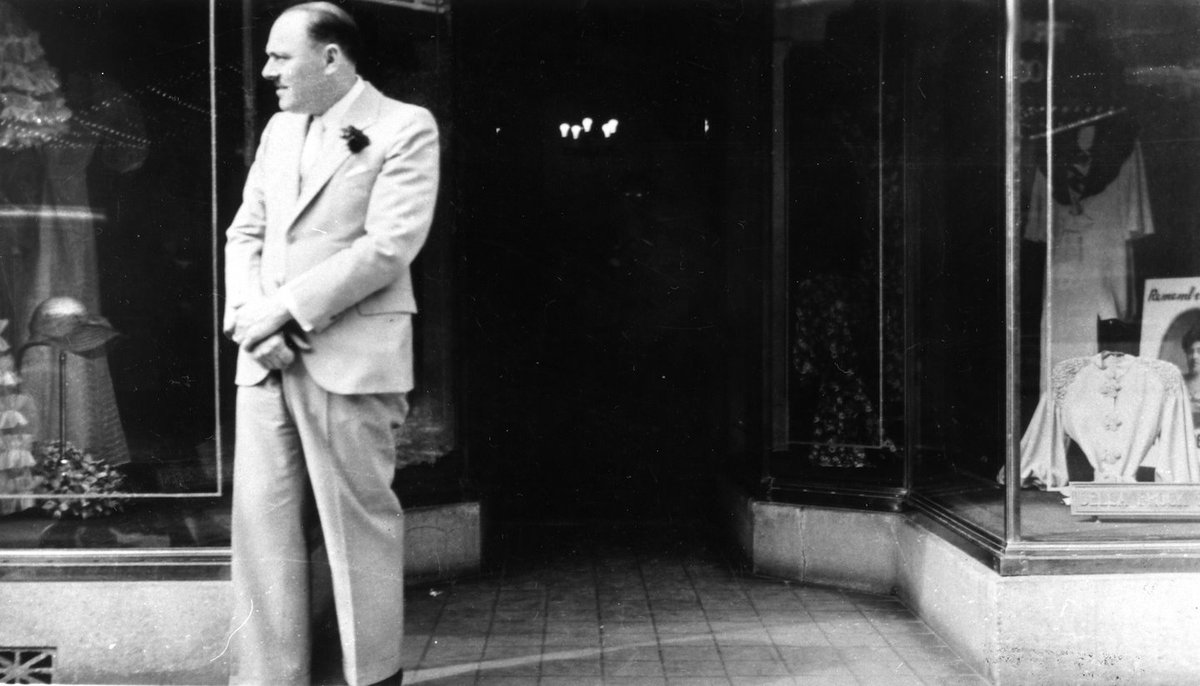 A photo from 1935: Sam Diamond outside  Della Frocks, his shop at 1640 W Howard in Rogers Park