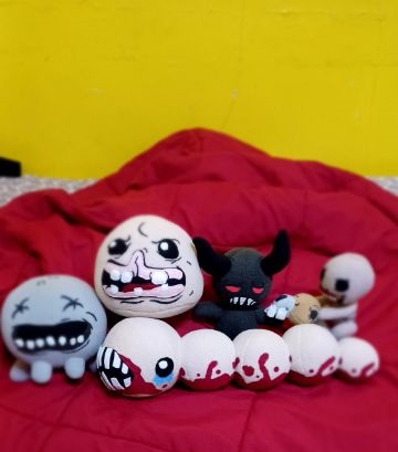 ArrTeaSea's tweet photo. recently made some Binding of Isaac plushies which put me financially back as well because the package got lost overseas 🤡so we're sending 1 by 1 but they are my most recent examples to show y'all https://t.co/Qaj88sISUv