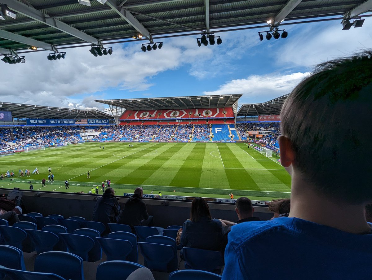 NickHain23's tweet photo. The boy's first @CardiffCityFC game today &amp; 🌲 points with a last minute winner went down very well 👏

He's buzzing with his @aaronramsey shirt &amp; @MarkMcguinness0 programme 🐦

#Fanforlife
#Bluebirds https://t.co/15qUlvXyzY