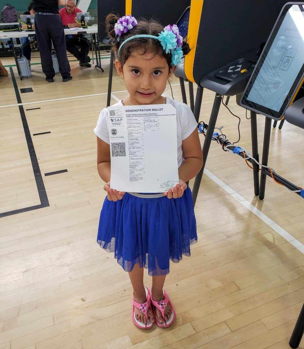 SportsCrockpot's tweet photo. Celebrating #WomensEqualityDay w/ a throwback to when my daughter was trying a demo of LA County's then-new voting system. She, like so many young women, is the future! 🗳 @LACountyRRCC #LAvotes #NineteenthAmendment https://t.co/KsqYONt2Xm