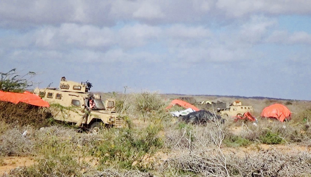 ArlaadiMnetwork's tweet photo. PHOTOS: Aftermath of todayโs deleterious attack by #AlShabab on the army camp housing #Somali troops at #Cawsweyne area in โโ#Galgudud region.
The militant group published these photos with claims of victory despite there being no independent confirmation.
The federal government faces growing pressure to give an explanation about how the intel agency failed to provide a tip to prevent the deadly assault.