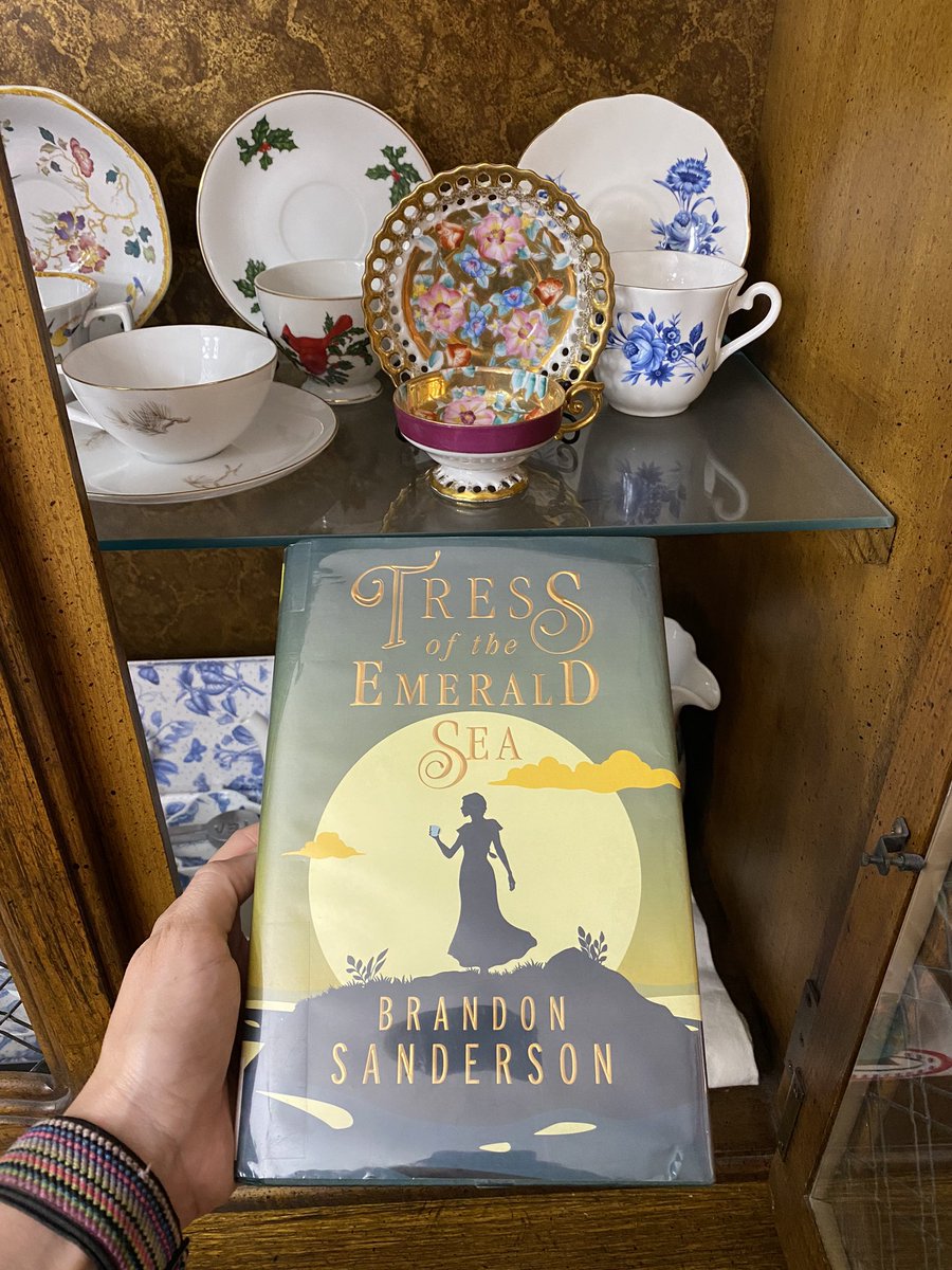 kristinawkelly's tweet image. Currently reading Tress of the Emerald Sea by @BrandSanderson . Obligatory photo with some of my own cup collection. #readingfantasy #teacups