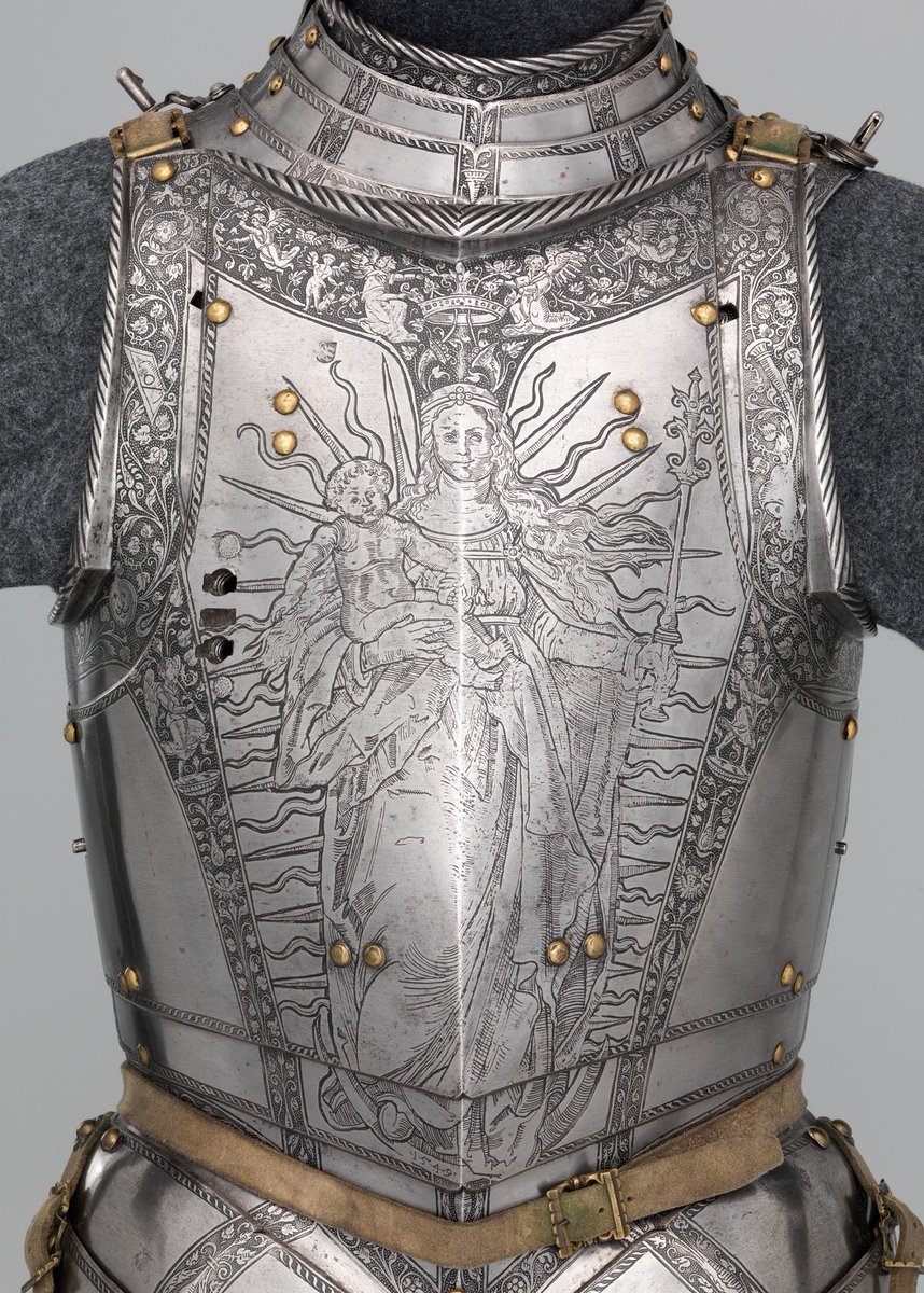 El peto de la armadura del Emperador del Sacro Imperio Romano Germánico Fernando I, elaborada circa. 1549. Solamente la pieza de la imagen pesa 24 kilos! Noten la magnífica imagen de la Virgen llevando al niño Jesús grabada sobre el peto con magníficos detalles. La pieza se