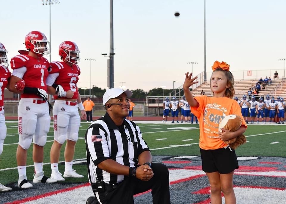 Eisenhower student and Leukemia survivor Haven James flipped the ceremonial coin toss in last nights “Orange Out” game vs. Chicago Taft.  What a night!!