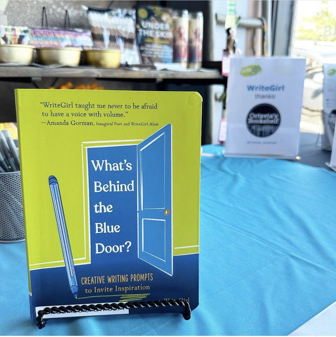 We are celebrating the launch of our very own writing journal with creative writing prompts! Pick up your copy of “What’s Behind the Blue Door?” at Octavia’s Bookshelf! #BlueDoor #writingjournal #writingprompts