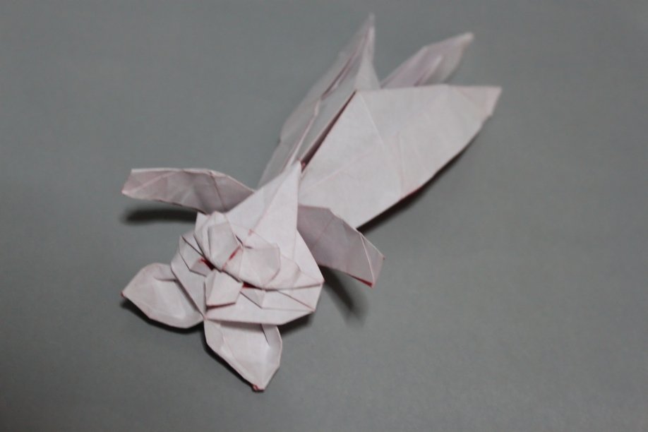 AlphCherno's tweet photo. Lazy cat
Designed: @Kyohei_Katsuta 
Folded: @AlphCherno 
It was fun during the process of color-changing, but my paper was torn a little😅. I can learn a lot from his book. https://t.co/mAsScyhaJc