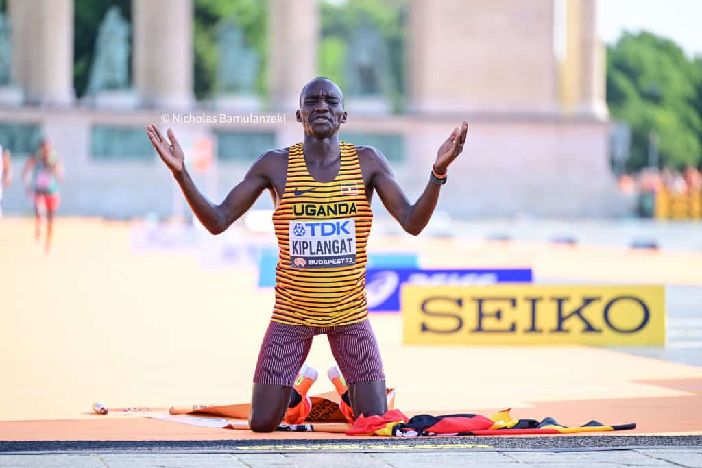 HamuzaYiga's tweet photo. 🇺🇬 flag raised high and higher over and over again , Victor Kiplangat world marathon champion 2023 BUDAPEST https://t.co/yazjV3o957