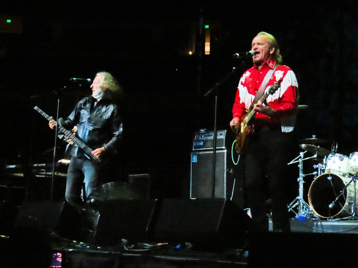 AlanToddWHS's tweet photo. Just got back from @Lost80sLive at @HondaCenter and seeing OUR headliner @WangChungMusic.  Wonder if Jack's shirt is a souvenir from Texas?  More pics to follow.

#WangChung #NickFeldman @JackHues1 #livemusic #concert #concerts https://t.co/iW2rHdtsTU