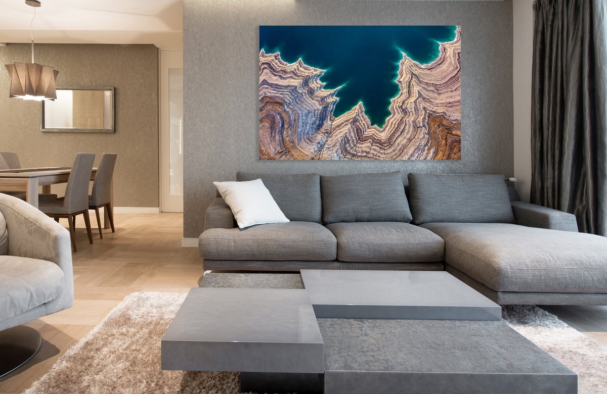 Experience the world from new heights with Donn Delson's aerial art. Shot from helicopters over two miles above, his images reveal vibrant colors and patterns that often appear abstract. Dive into his large-scale works for a truly immersive visual journey.

#AerialPerspective