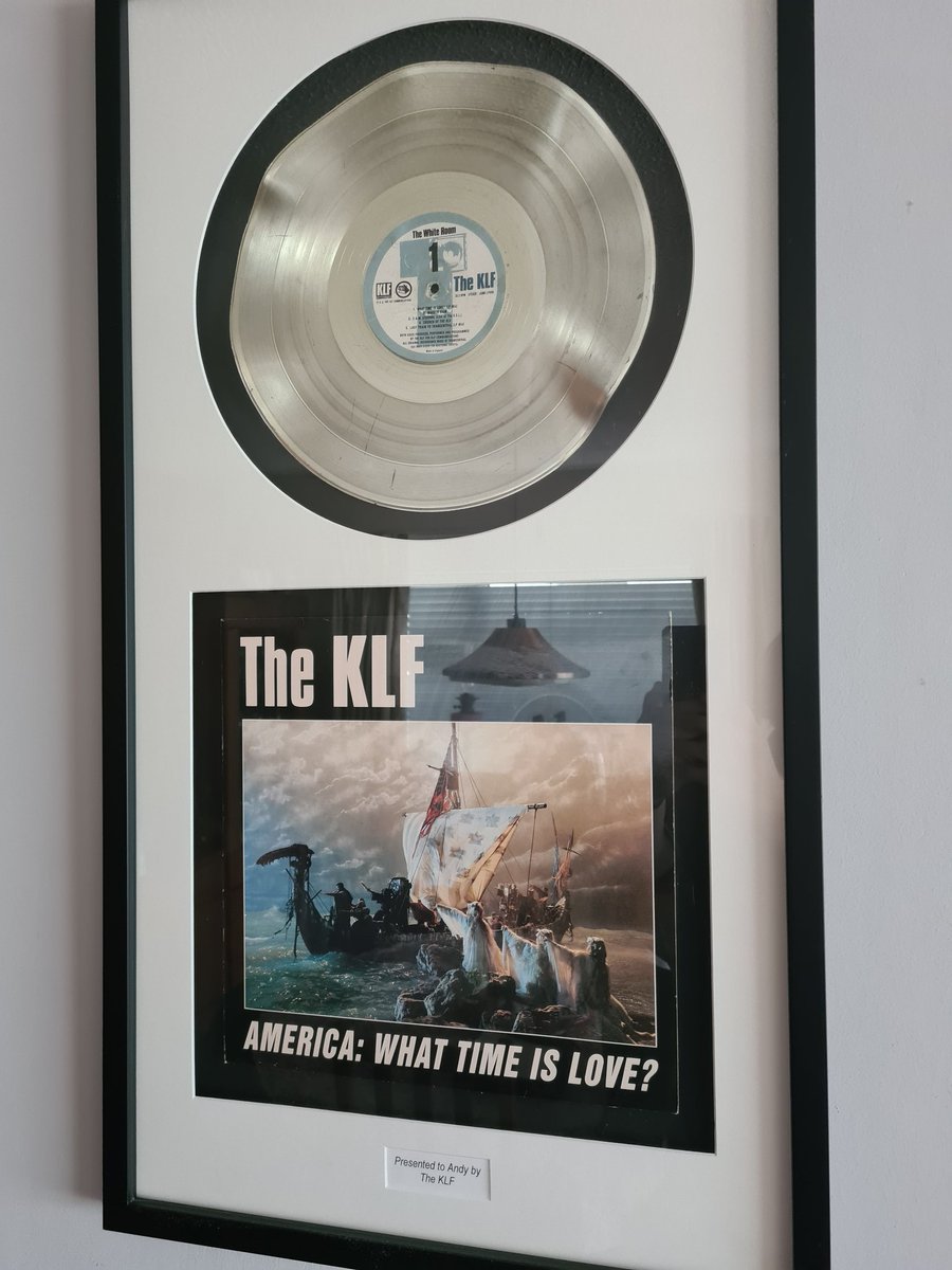 Andrew_S_0001's tweet photo. @TheKLFRS I met Jimmy after filming finished for the video of America What Time Is Love (I was one of the vikings rowing the boat). Here's the gold disc that was nailed to the mast which he signed and gave to me. https://t.co/OBe8Ce4dTG