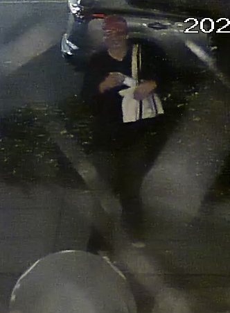 If you recognize this jerk, please text the shop at 206 251 0630. He spray painted graffiti all over the entrance of our shop last night at 1:07 AM. We'd like him to compensate us for materials and time for removal. Floral print painter hat, tote bag, glasses, slender.