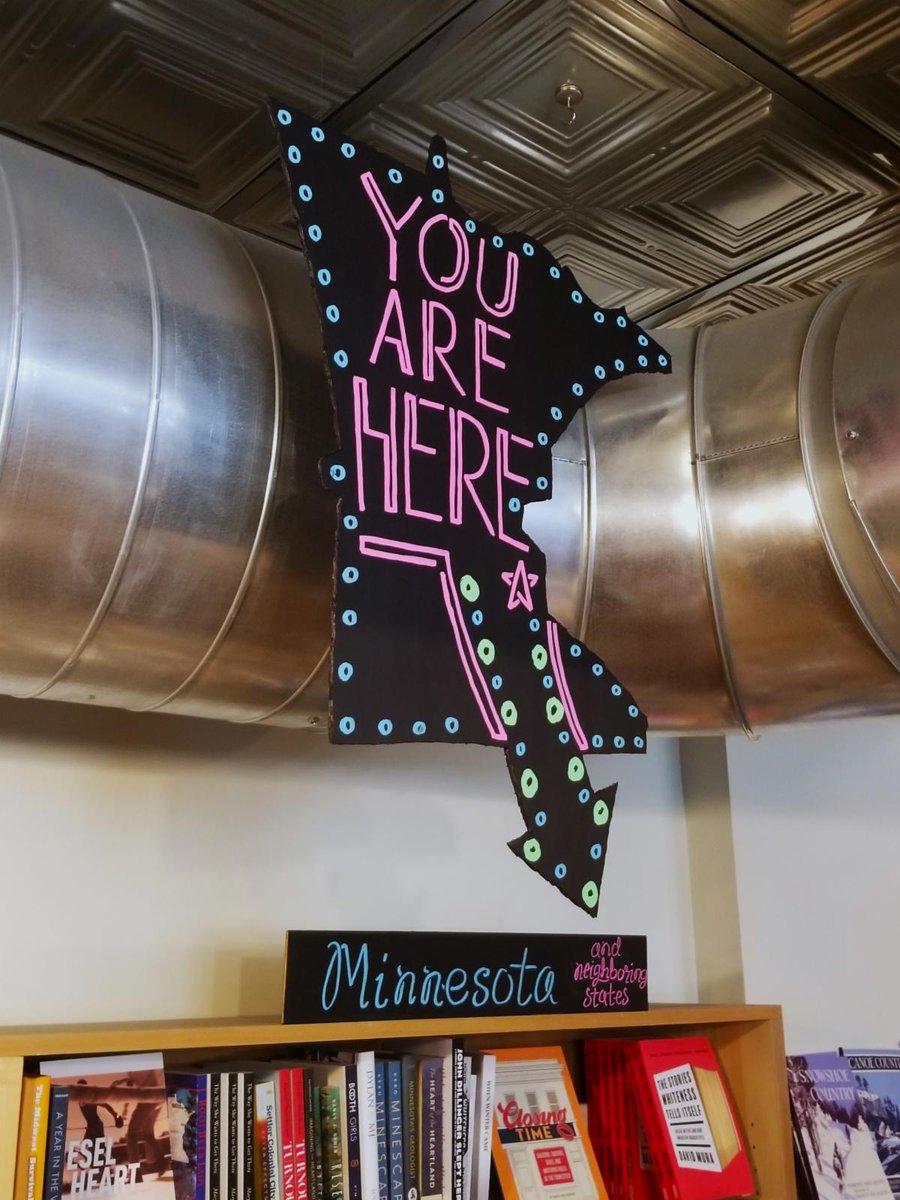If you're not sure where you are, try our new sign, located over the Regional Interest section!  And remember: if you find yourself in Next Chapter Booksellers, you are also in St. Paul, the greatest Minnesota metropolis this side of the Mississippi! Stay cool, readers!