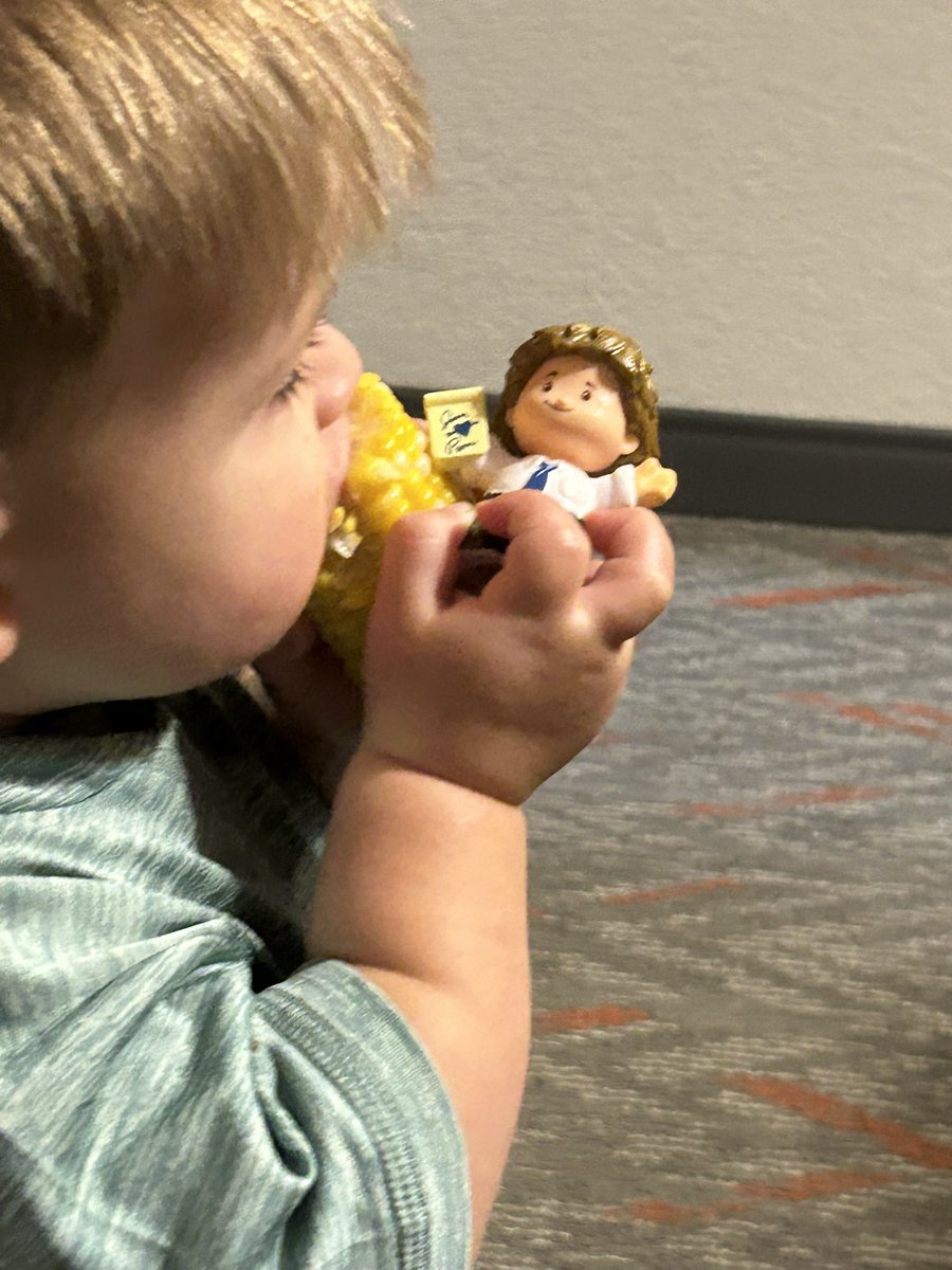 Corn in the cob and Little People toys are life. #grandmasboy