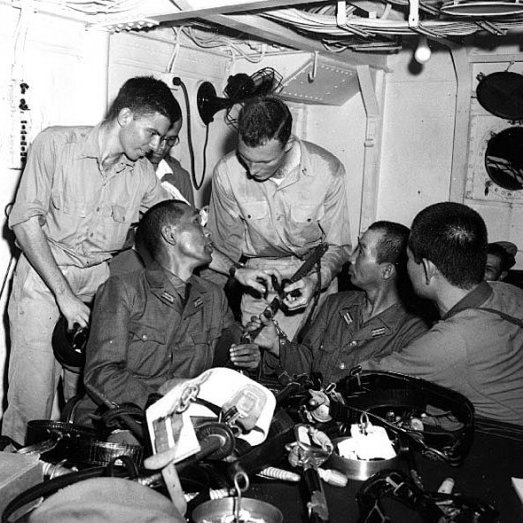 TammiMinoski's tweet image. #OTD 1945: Naval officers examined Japanese officers' belongings on board the USS Nicholas. The men were on board to provide piloting services for Third Fleet ships entering Sagami Wan &amp;amp; Tokyo Bay. #JapaneseSurrender #MilitaryHistory