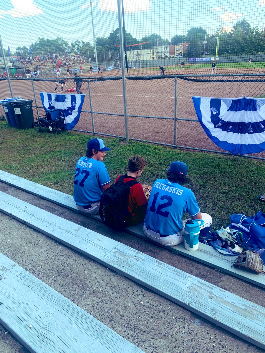 Our batboy William, hanging out with the starting battery for the final game. 

He’s got Desi’s glove on, maybe pushing for a last minute line-up change