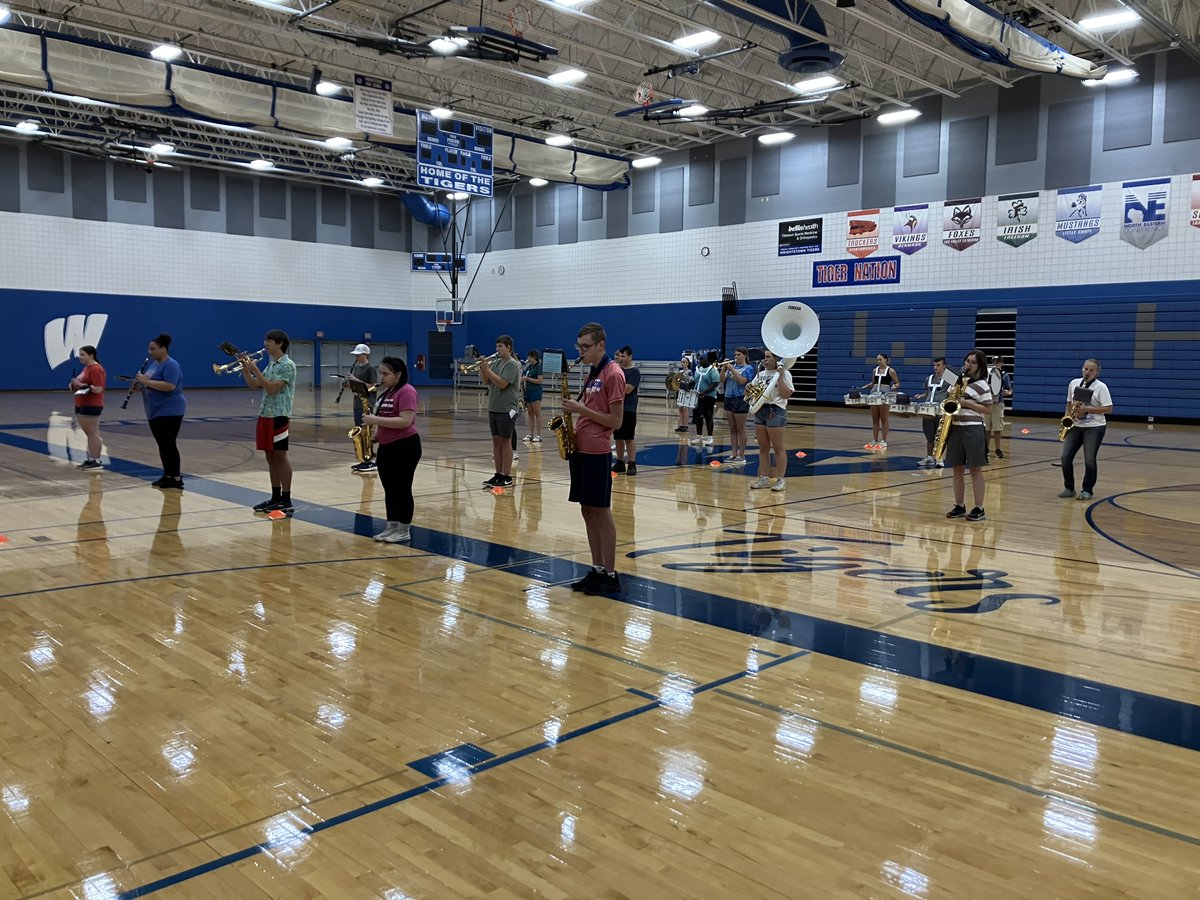 WrightstownCSD's tweet photo. When it’s too hot to march outside, they march in the gym! ☀️

Color guard practiced in the auditorium during the hot weather last week.

#WCSDStrong https://t.co/dSwLh5F42G