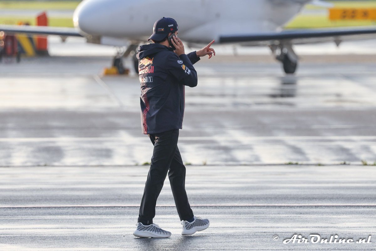 Sergio Perez at Schiphol Airport getting on his private jet