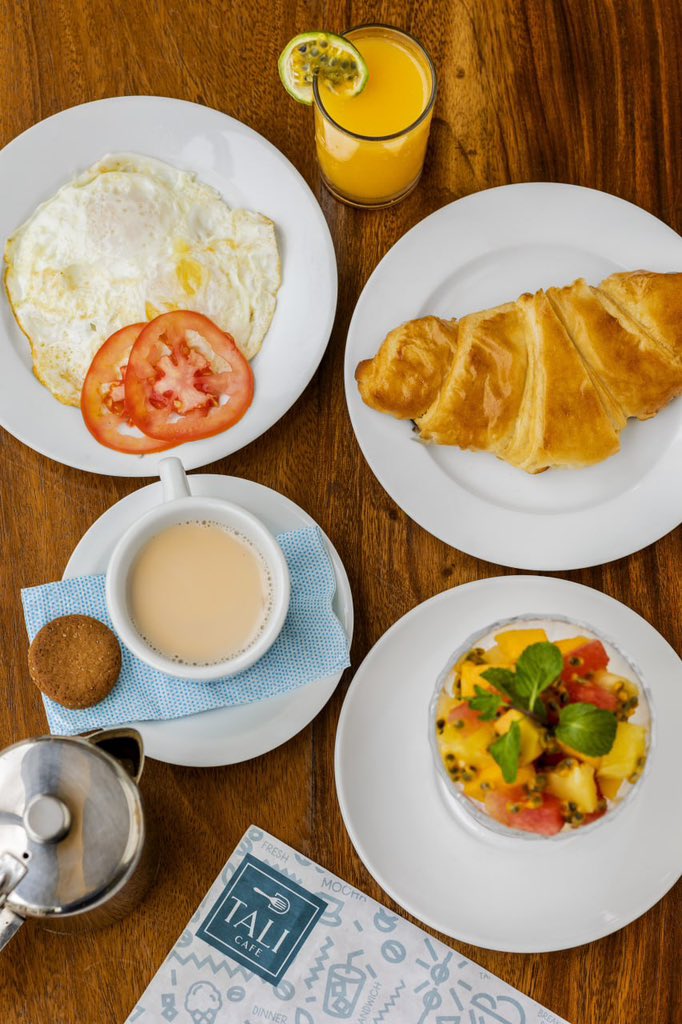 Breakfast set includes either coffee or tea, Croissant/muffin, Eggs prepared according to customer’s preferences, a Fruit bowl and a Glass of juice.  For Lunch you choose between Stir fried chicken, Pan fried Goat or a Vegetable burger. 

#workspace #foodie #lunch