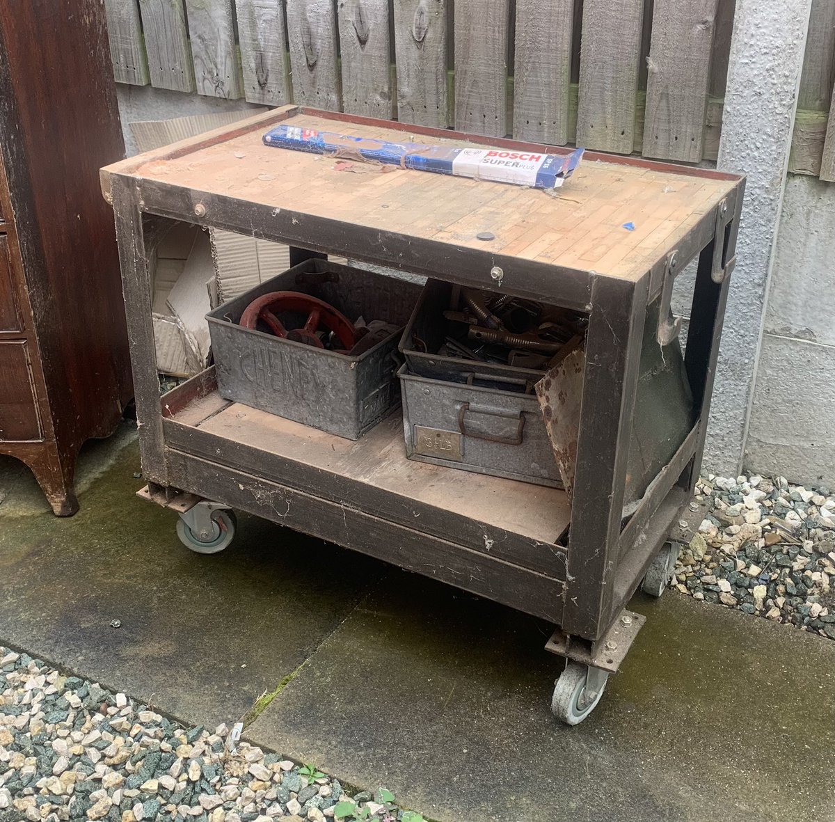 2016industrial's tweet photo. Anyone need a heavy duty trolley? I put it on castors a few years ago & had a pillar drill sat on it. Not needed. So it’s sat outside so needs to go. Would make a great potting bench. Free to a good home #workshop #workshoptrolley #gardening #greenhouse #pottingbench https://t.co/FjMxfymxsH