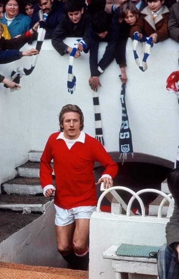 Today’s player coming out the tunnel is Denis Law