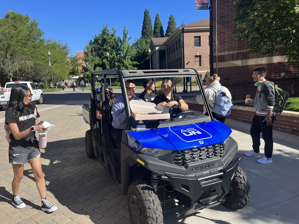 Pres_Sandoval's tweet photo. To celebrate the start of the fall semester and the first-day of classes, I joined @nevadaasun leadership in traveling around our beautiful @unevadareno campus welcoming back students and handing out donuts! #WelcomeBackPack #GoPack https://t.co/ymSTNwjGYE