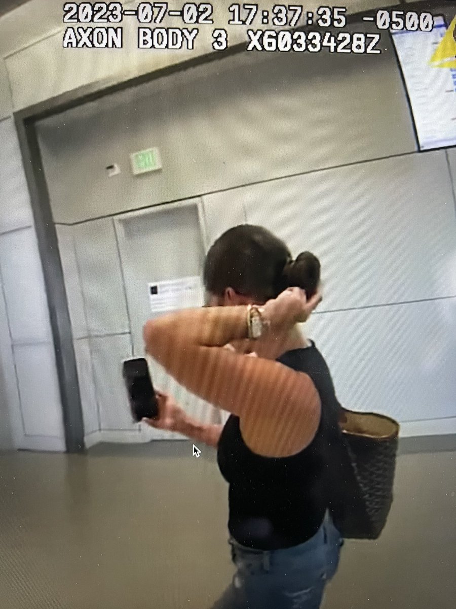 andrewcstokes's tweet photo. @jendotlove @Tiffany_Gomas At 17:37:35 of the police body cam footage after she had departed the plane, the wrist tattoo is visible as she is holding up her phone in her right hand. It is the same woman. https://t.co/tbvvGbeSje