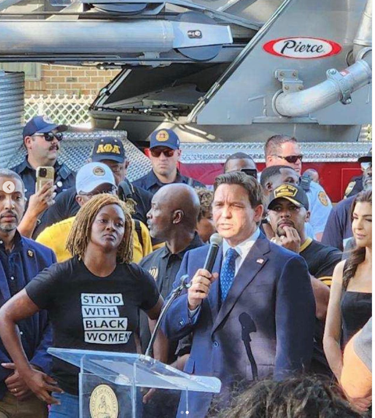 Three Black lives were taken tragically by gun violence in Jacksonville this weekend. Gov. DeSantis has no business at their vigil after his racist policies have fueled the flames of hatred in our state. @angieforfl embodies true leadership -- and this photo says it all.