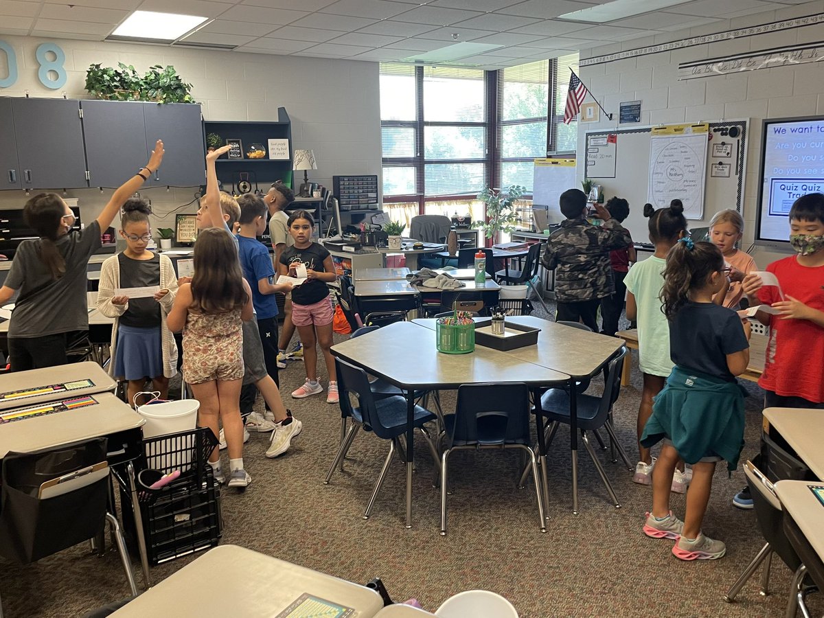 PVWollberg's tweet photo. Moving around the classroom as we Stand Up, Hand Up, Pair Up to prepare for Quiz Quiz Trade! Such a fun way to learn more about our new friends in Room 408😀#pvlearns #engagementstructures https://t.co/DN7Dw55RZL