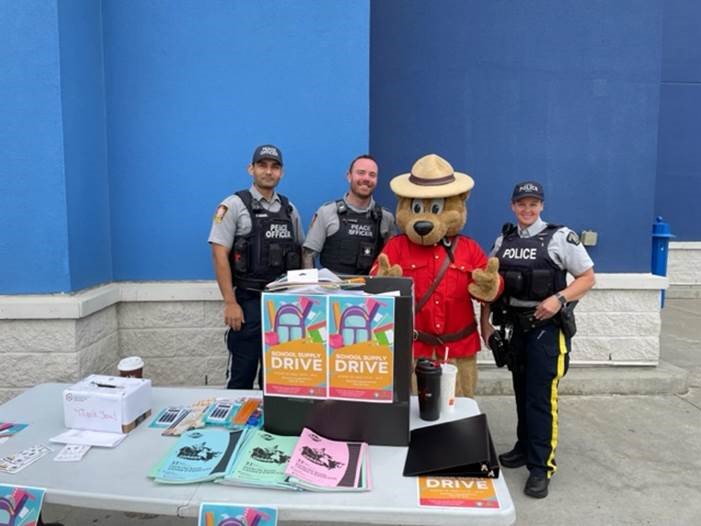 RCMPAlberta's tweet photo. We’re so happy to help families in need this year! Our members in #FortSaskatchewan organized a school supplies drive, where they raised money and collected donations for local families to help ensure every child is prepared for the new school year ahead! #CommunityKudos https://t.co/PrpNoFVjdF
