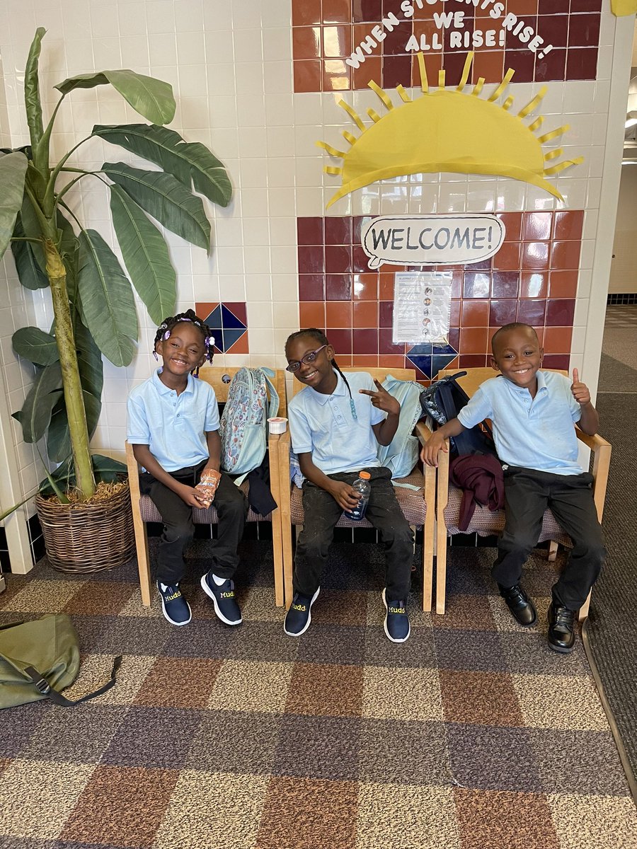 The happy faces of 3 of our babies that school is back in session. #dpscd