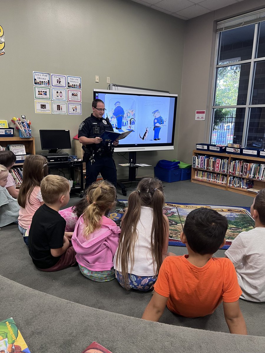 Kendall Kindergarteners had a special guest in the library today! Officer Russell dropped by to Read Officer Buckle and Gloria! Thanks for the safety tips!!! 
<a href="/KendallElem/">Kendall Elementary School</a> <a href="/BoerneISD/">Boerne ISD</a>
