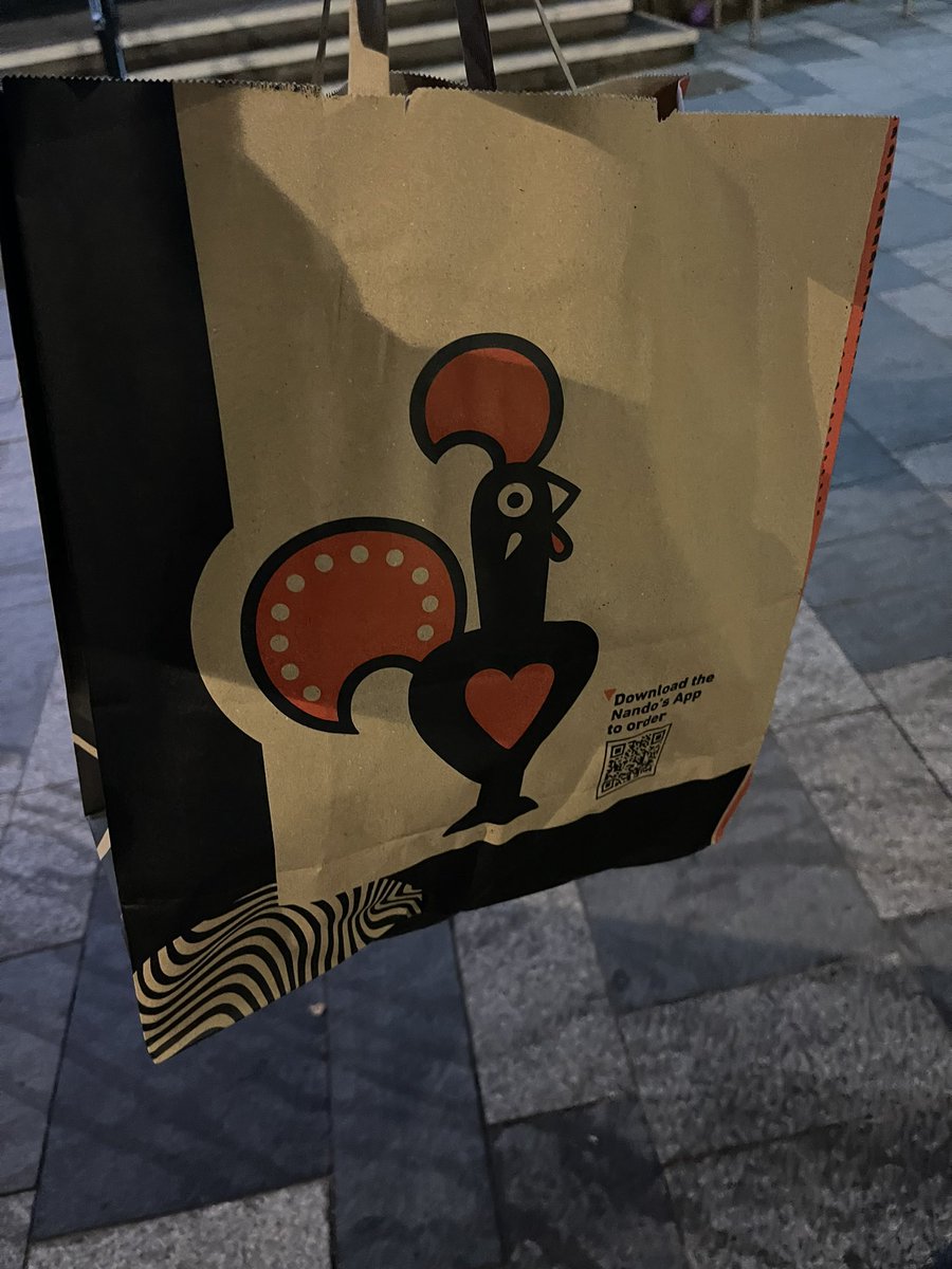 CAGMacarthy's tweet photo. Not just any paper bag: Big up Mr Idris &amp; Staff @nandosuk East Croydon for giving me the Royal treatment because my late night, last minute munchies takeout order was running late.  #nandos #chicken #hangry #blessed #bankholiday #CARNIVAL2023 https://t.co/UxwJIutFrD