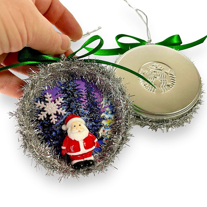 BluKatDesign's tweet photo. New for coffee lovers!!! These unique upcycled treasures are lovingly crafted from coffee tin lids, creating a quirky twist on the classic holiday ornament https://t.co/ga0CVybEHx #shophandmade #shopetsy https://t.co/aGf1sZbdMT