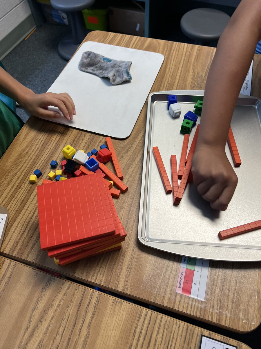 OwensOgres's tweet image. Mathematicians at work. Building numbers and learning place value today.  #learningshouldbefun