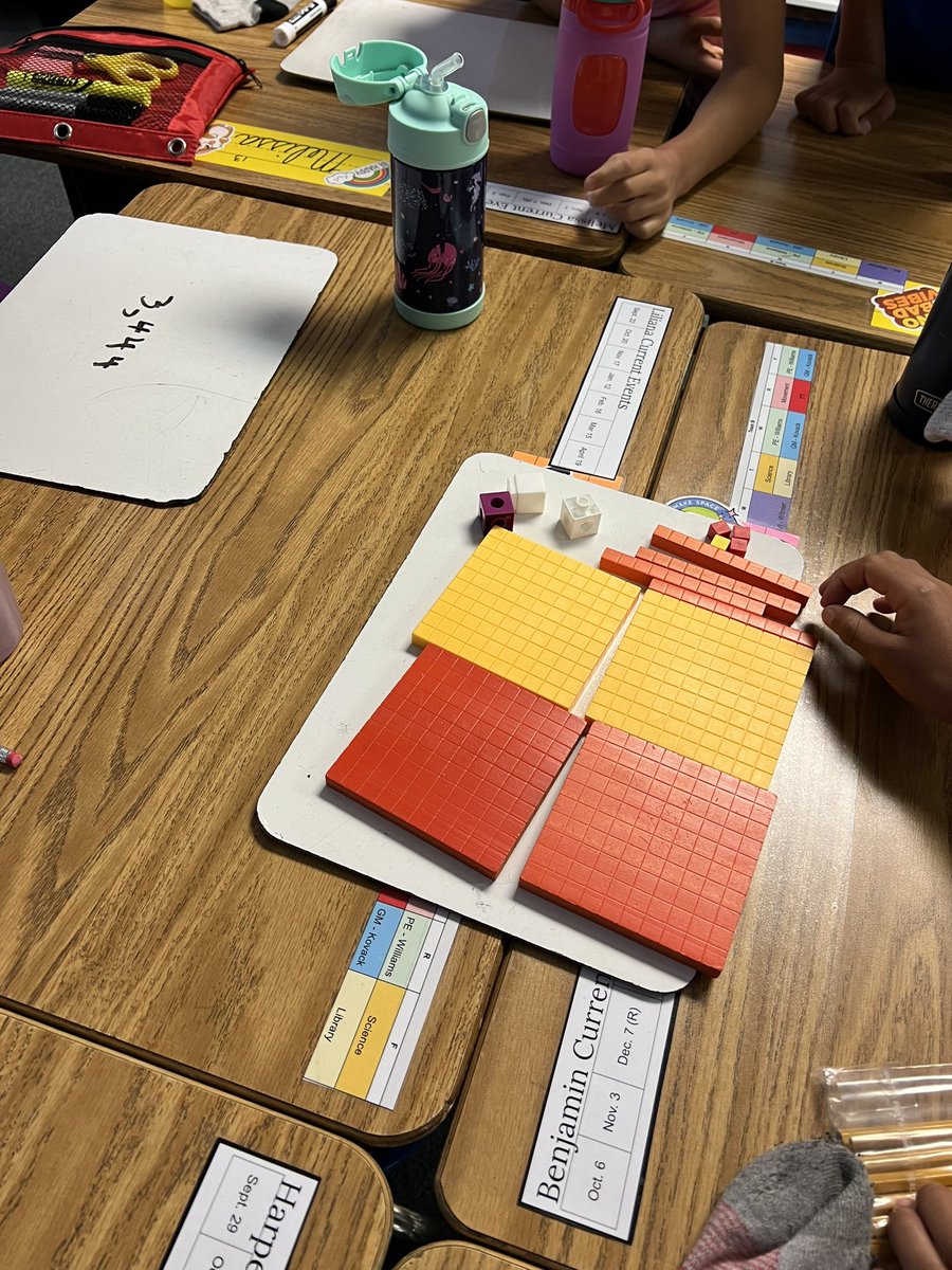 OwensOgres's tweet image. Mathematicians at work. Building numbers and learning place value today.  #learningshouldbefun
