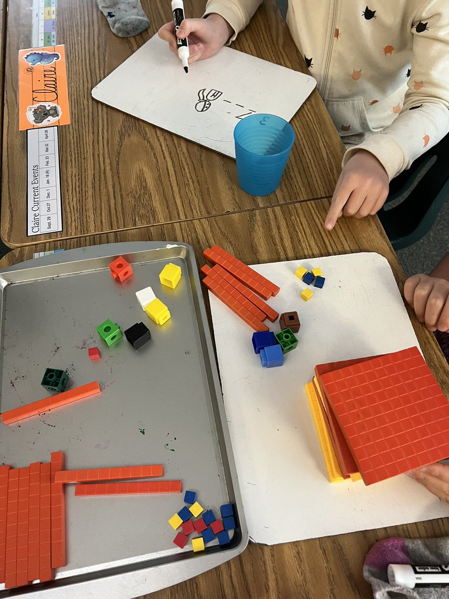 OwensOgres's tweet image. Mathematicians at work. Building numbers and learning place value today.  #learningshouldbefun