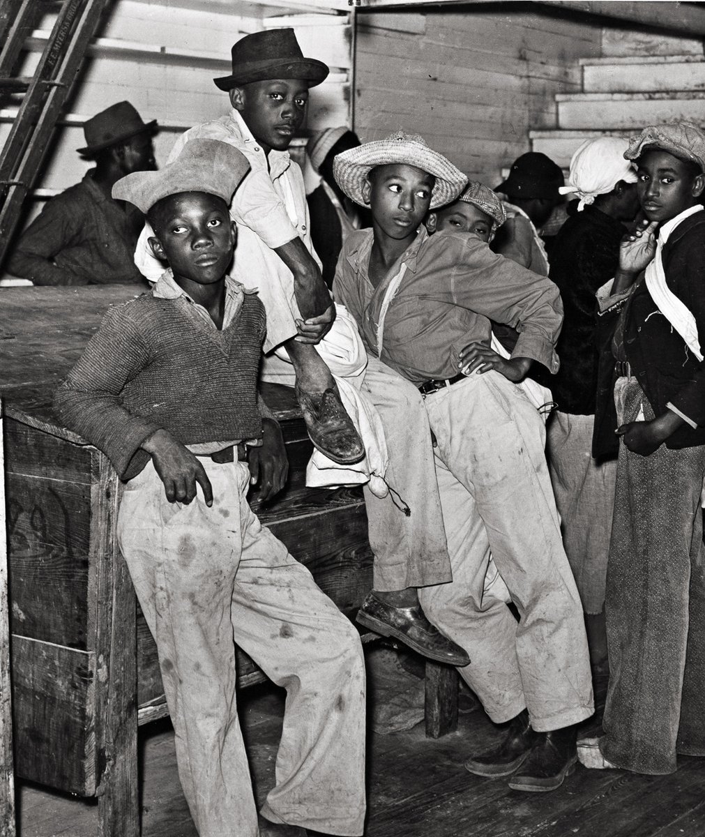 📸 Marion Post Wolcott. Young boys waiting in plantation store to be paid for picking cotton, Clarksdale, MS, 1939. #vintage #blackandwhitephoto