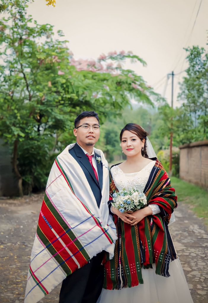 Bride and groom in Zo/Zou Traditional Shawl

#zou #zoutribe #zo #zodress #zopuan #zoupuondum #zoupuandum #zohnahthlak #chin #kuki #mizo #zomi #chikim #beingchikim #sendoff #sendoffdress #bride #bridedress #groomdress #groom