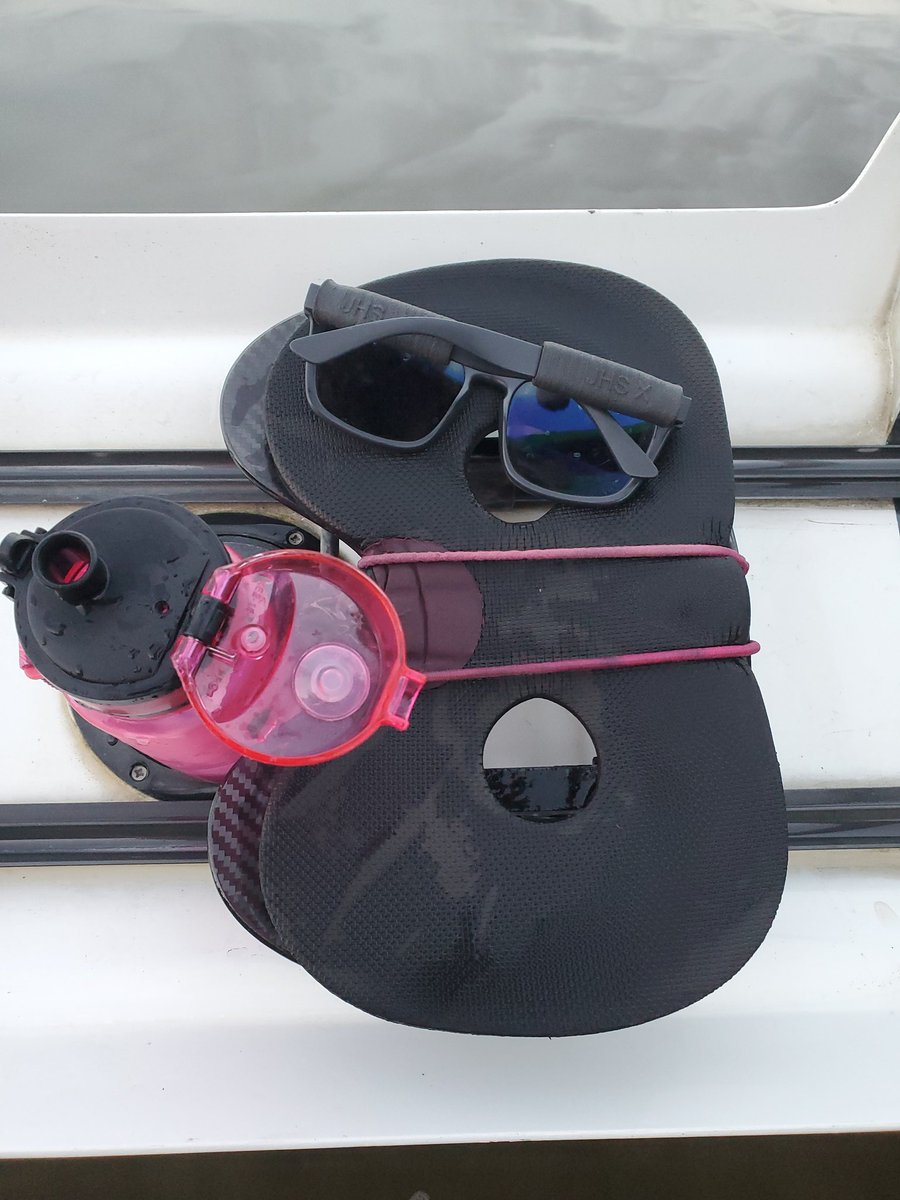 Items you need for unexpected wild swimming. Sungod glasses with home made floats, seatpad with elastic bungee, water bottle with protected nozzle. #senseofhumour