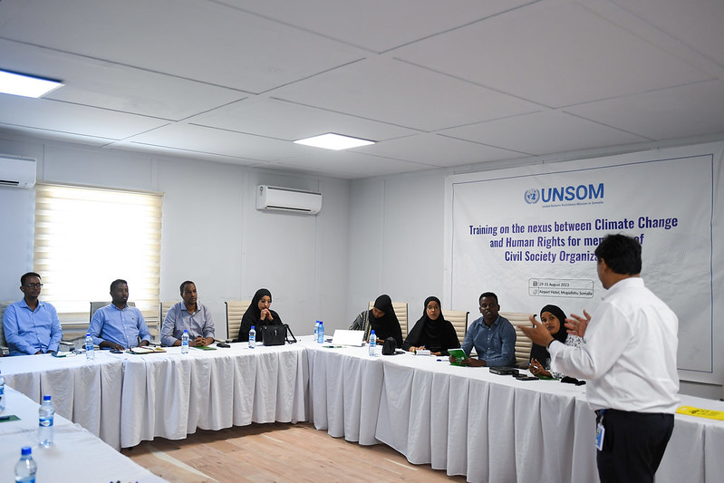 UNSomalia's tweet photo. A three-day, @UN-backed training on the links between #humanrights and #climatechange in #Somalia began today in #Mogadishu - participants examined how changing climate patterns lead to food insecurity, conflict over shrinking resources and displacement; and how climate change's consequences especially affect #women, persons with disabilities, children and marginalised groups.