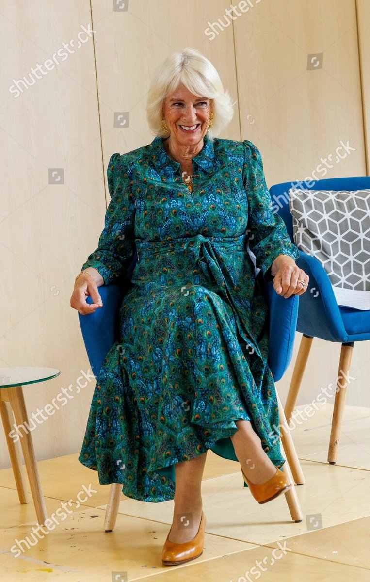 Queen Camilla wearing her beautiful Liberty Green Peacock Manor silk dress  today