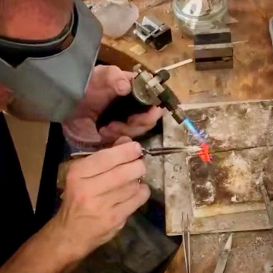 Roberts_London's tweet image. Uniting artistry and metal: Watch the magic as we solder these T-Bar pendants together at our bench. When two pieces become one, that’s when the real story begins. 🌟 #CraftedWithPassion #TBartogether #BenchChronicles