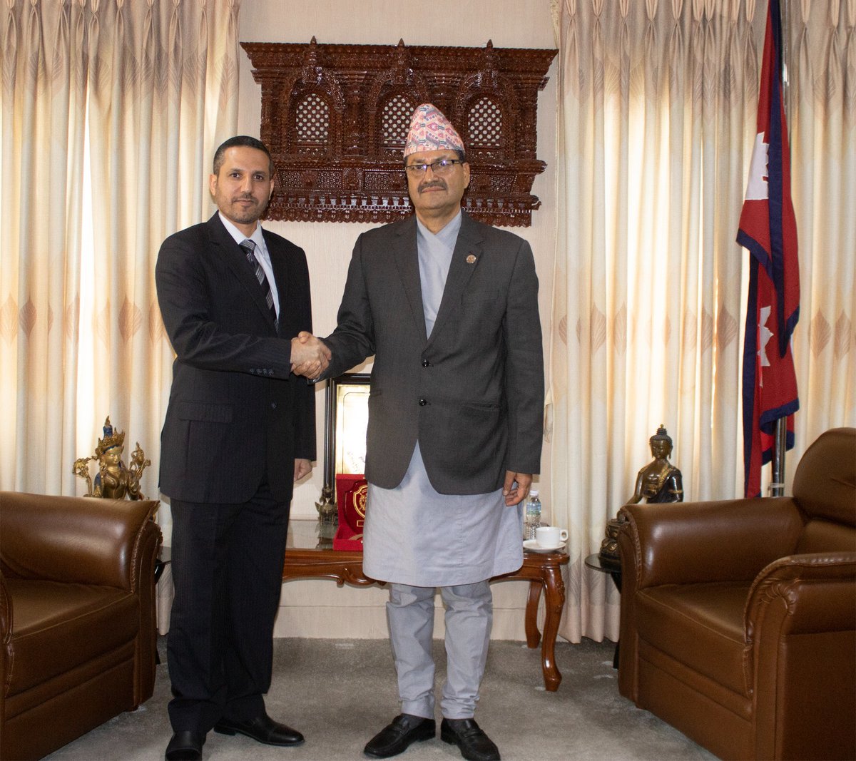 MofaNepal's tweet photo. The representatives of His Highness Shaikh Nasser bin Hamad bin Isa Al Khalifa, Commander of the Royal Guard of Bahrain, Colonel Mr. Mohammad Juma and Mr. Christopher Burrows called on Hon Foreign Minister @NPSaudnc at MoFA today. 

@PaudyalBR 
@sewa_lamsal https://t.co/V9ElJ5XNmN