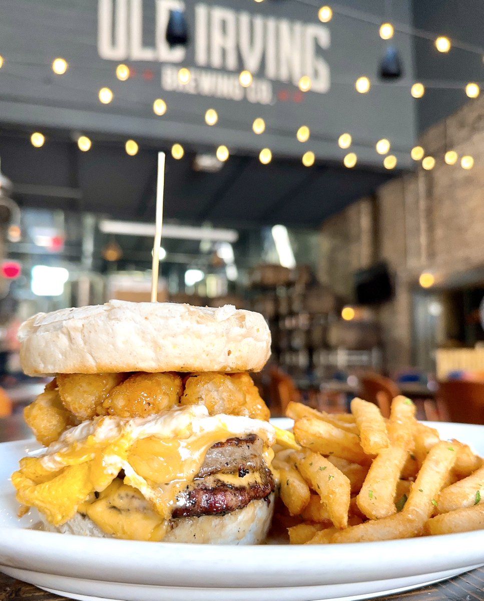 OldIrvingBeer's tweet photo. #burgeroftheweek = Breakfast Burger! 4oz USDA Prime Beef patty wood-fire grilled, sausage breakfast patty, over hard fried egg, American cheese, maple aioli, and tater tots on a toasted English muffin. Tasty! #breakfastanytime https://t.co/U658ZSwb0G