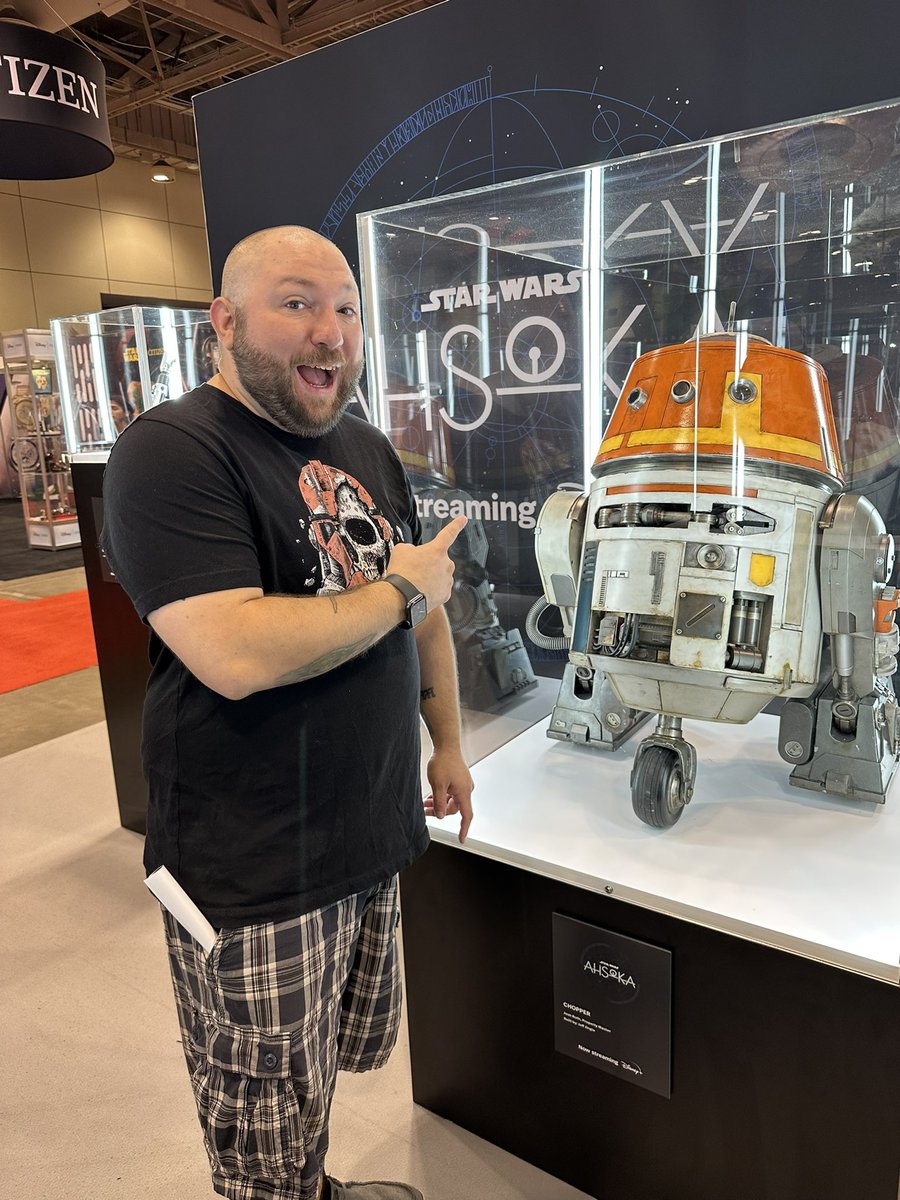 permittedpod's tweet photo. .@JulianHasTheCon may have had his “gone to Heaven” moment at #fanexpocanada visiting the #Ahsoka booth 😅.  Our review of episodes 1+2 will drop late tonight!  #AhsokaTano #StarWars https://t.co/Hip3LDnap8