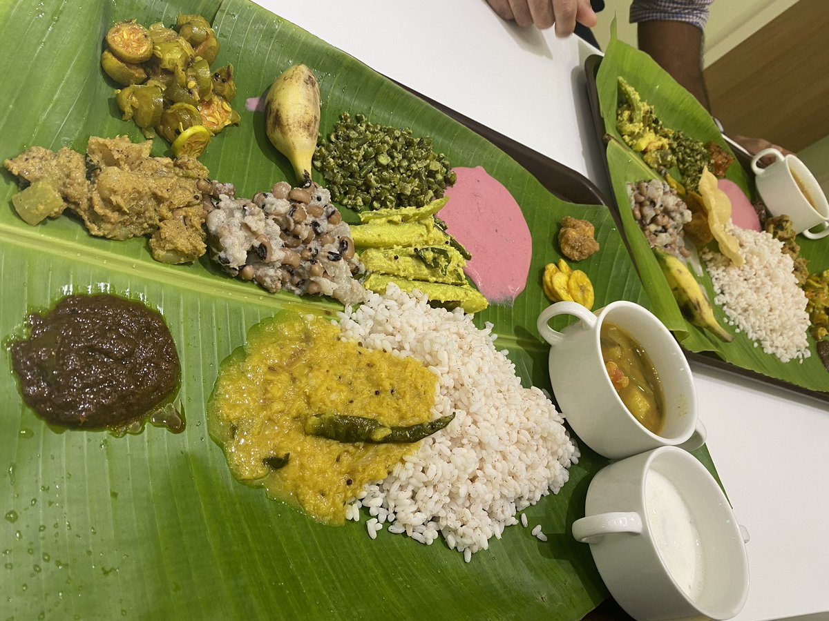 hteewalker's tweet photo. Happy Onam!!! Had a lovely celebration at lunch eating Keralan food from a traditional banana leaf. Feeling very lucky to work in such a vibrant and diverse community 💛💛💛💛🧡🧡🧡🧡🧡 https://t.co/iCBQE4dS5y
